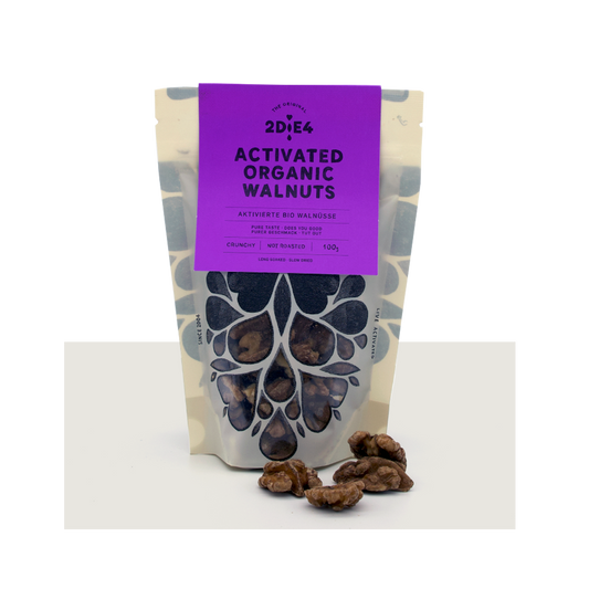 2DiE4 activated organic walnuts in resealable packaging with whole walnuts shown, 100g size.